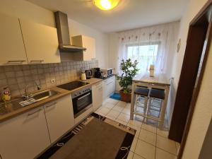Kuchyň nebo kuchyňský kout v ubytování Ferienhaus Helene