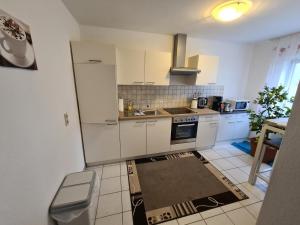 Kuchyň nebo kuchyňský kout v ubytování Ferienhaus Helene