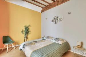 Postel nebo postele na pokoji v ubytování Avignon apartement à 2 pas du Palais de Papes