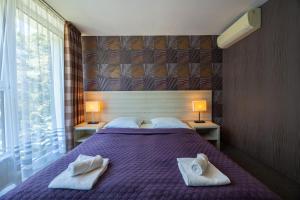 Postel nebo postele na pokoji v ubytování Baltic Inn