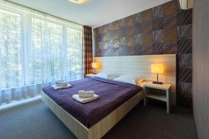 Postel nebo postele na pokoji v ubytování Baltic Inn