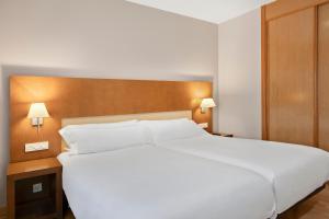 Postel nebo postele na pokoji v ubytování B&B HOTEL Logroño Las Cañas