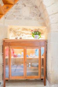 A bed or beds in a room at HISTORIA- Dimore Vico Ghezzi
