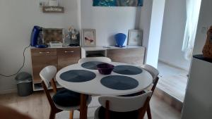 a dining room with a table and chairs at Ravne Rest House in Visoko