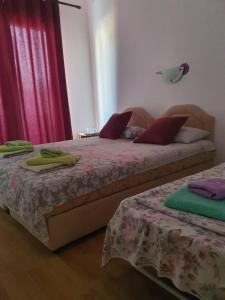 Postel nebo postele na pokoji v ubytování Villa Grafenberg Ulcinj