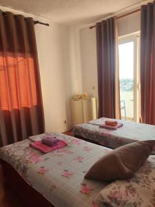 Postel nebo postele na pokoji v ubytování Villa Grafenberg Ulcinj