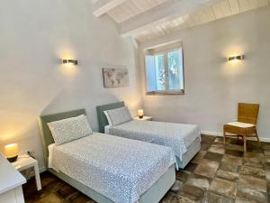 A bed or beds in a room at Al Teatro di Tavignano