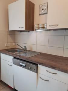 Kuchyň nebo kuchyňský kout v ubytování Gästehaus Hilda