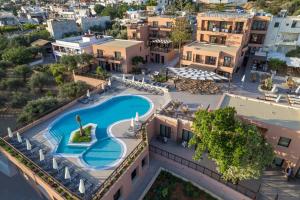 an aerial view of a resort with a swimming pool at Hotel Pyriá in Hersonissos