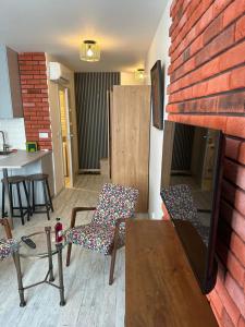 Posezení v ubytování Apartament Orla + 1 fotografie