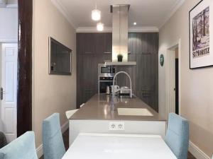 Η κουζίνα ή μικρή κουζίνα στο Apartamento Atocha Madrid Centro AVE muy grande