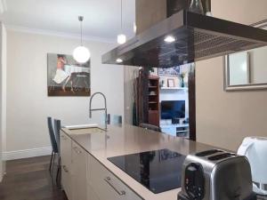 Η κουζίνα ή μικρή κουζίνα στο Apartamento Atocha Madrid Centro AVE muy grande