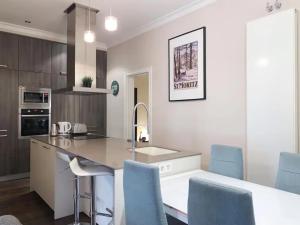 Η κουζίνα ή μικρή κουζίνα στο Apartamento Atocha Madrid Centro AVE muy grande