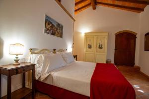 Voodi või voodid majutusasutuse Torciano Hotel Wine & Winery, Tuscany toas