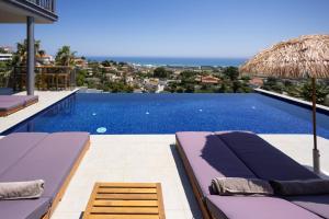 a view of a swimming pool from a villa at Villa Aya Barca in Santa Susanna