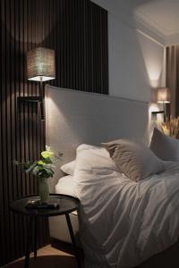 Ένα ή περισσότερα κρεβάτια σε δωμάτιο στο Hotel Schachner
