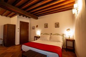 Voodi või voodid majutusasutuse Torciano Hotel Wine & Winery, Tuscany toas