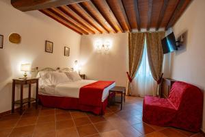 Voodi või voodid majutusasutuse Torciano Hotel Wine & Winery, Tuscany toas