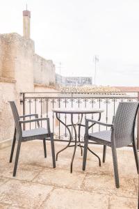 A balcony or terrace at HISTORIA- Dimore Vico Ghezzi