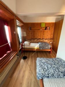 Postel nebo postele na pokoji v ubytování Appartamento Sole Alto