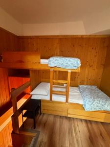 Postel nebo postele na pokoji v ubytování Appartamento Sole Alto