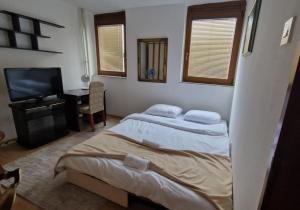 Postel nebo postele na pokoji v ubytování Room near University Campus in Sarajevo - Rooms Sarajevo