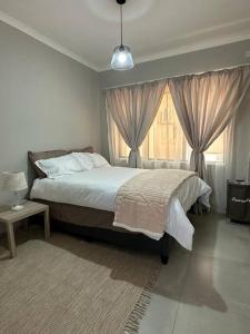 The Urban Hub in Block 5 tesisinde bir odada yatak veya yataklar