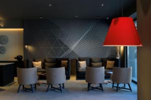 Χώρος καθιστικού στο Evanik Chic Hotel
