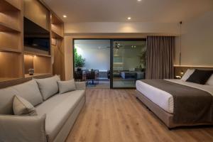 Ένα ή περισσότερα κρεβάτια σε δωμάτιο στο Evanik Chic Hotel