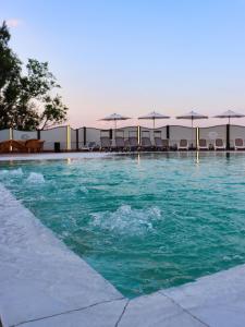 Bazén v ubytování Ile Hotel nebo v jeho okolí