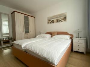 Postel nebo postele na pokoji v ubytování Villa Bergfried
