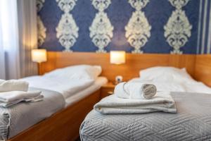 Postel nebo postele na pokoji v ubytování Baltic Inn