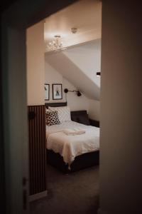 Postel nebo postele na pokoji v ubytování 16 Pilrig Guest House