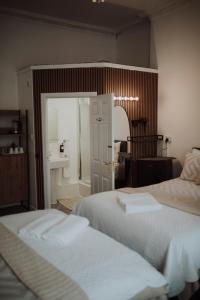 Postel nebo postele na pokoji v ubytování 16 Pilrig Guest House
