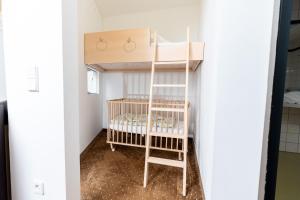 Ein Bett oder Betten in einem Zimmer der Unterkunft Pension Sonnengarten & Therme included - auch am An- & Abreisetag!