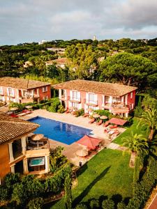 an aerial view of a house with a swimming pool at Domaine de l'Astragale in Saint-Tropez
