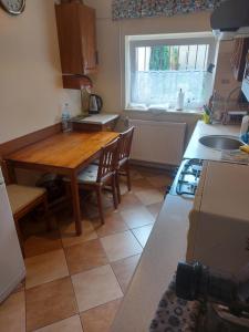 Kuchyň nebo kuchyňský kout v ubytování Kajetan