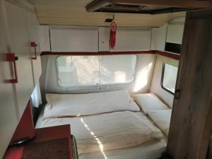 Postel nebo postele na pokoji v ubytování La Tanière de la Louve