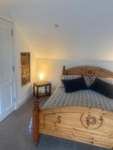 Ένα ή περισσότερα κρεβάτια σε δωμάτιο στο Ekerveley Lodge