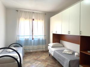 En eller flere senge i et værelse på Clarissa House