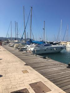 a bunch of boats are docked at a dock at Polis Chrysochous Entire Apartment in Polis Chrysochous