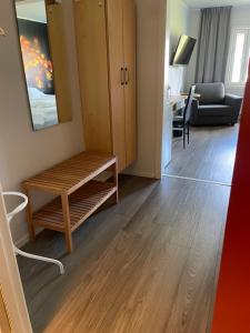 Postel nebo postele na pokoji v ubytování Hotell Smedjan