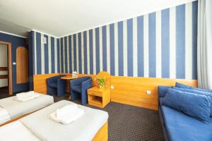 Postel nebo postele na pokoji v ubytování Baltic Inn