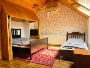 Postel nebo postele na pokoji v ubytování Penzion Trojna Lednice-vhodné na svatby,rodinné akce,teambuilding