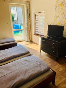 Postel nebo postele na pokoji v ubytování Penzion Trojna Lednice-vhodné na svatby,rodinné akce,teambuilding