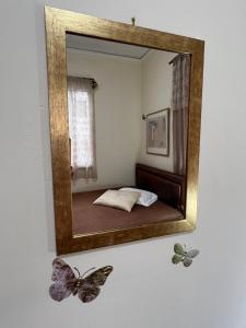 Postel nebo postele na pokoji v ubytování Ζαχάρω Suite