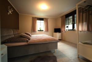 Postel nebo postele na pokoji v ubytování Apartment Leopold