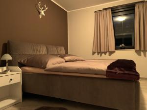 Postel nebo postele na pokoji v ubytování Apartment Leopold