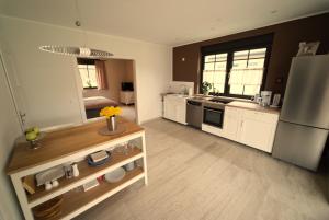 Kuchyň nebo kuchyňský kout v ubytování Apartment Leopold