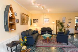 Posezení v ubytování Hotel Garni Am Deich